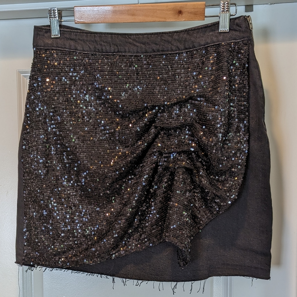 Black denim skirt with a sequined mock wrap in front